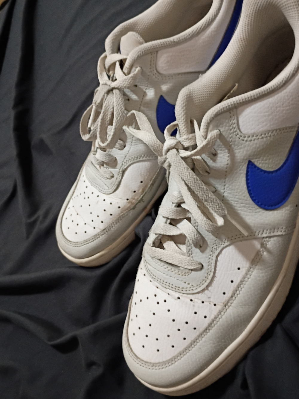 Nike White Sneakers with Blue Swoosh